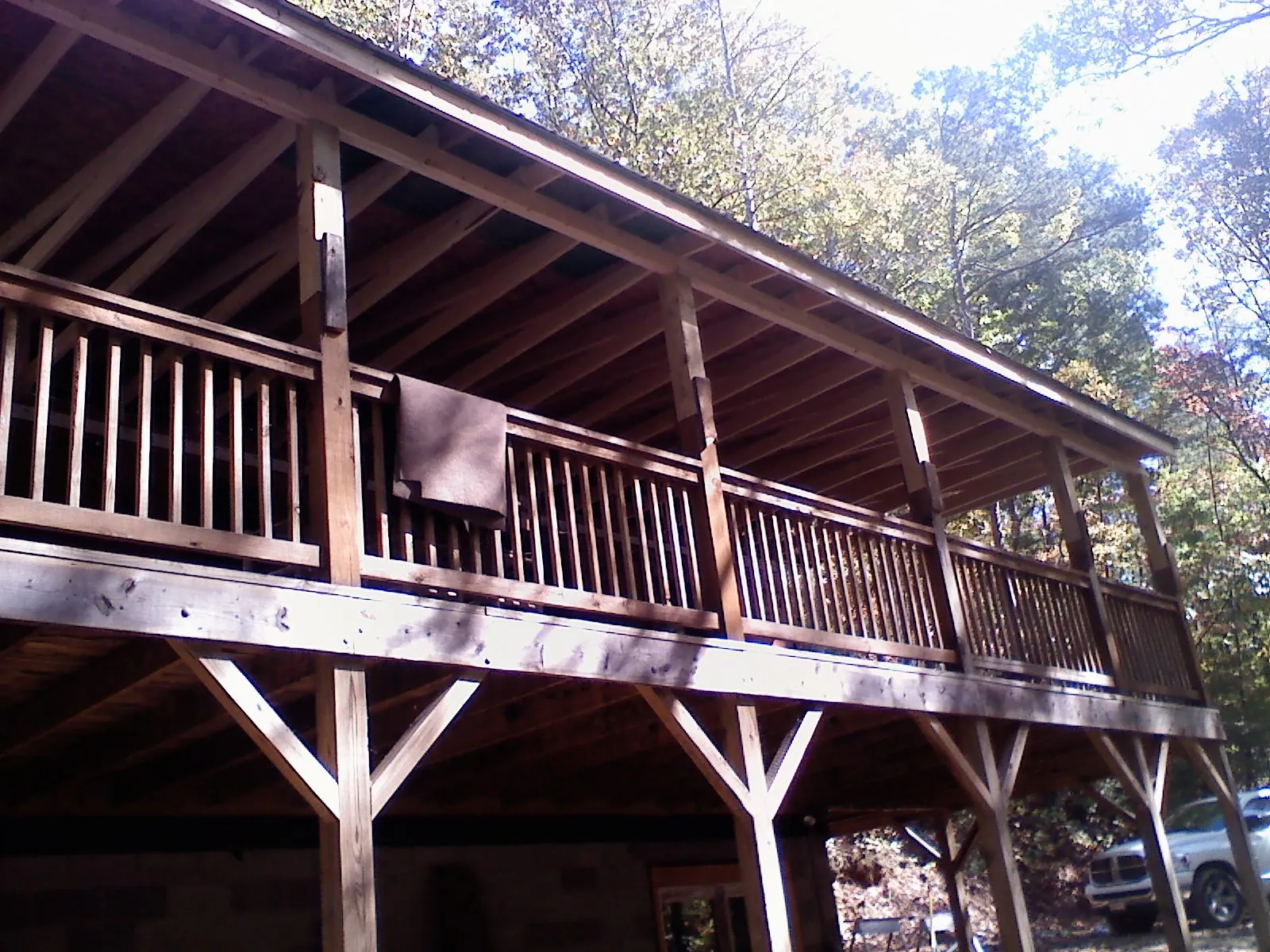 Timber framing under a new elevated porch and deck — Roof Leak Repair in Petal by Roofing Brothers